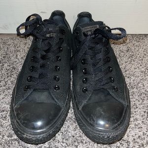 All black low top converse size 9 men 11 women’s.